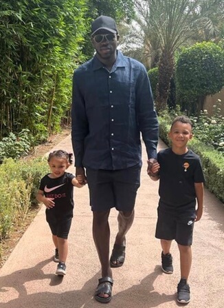 Charline Oudenot's husband, Kalidou Koulibaly and their children.